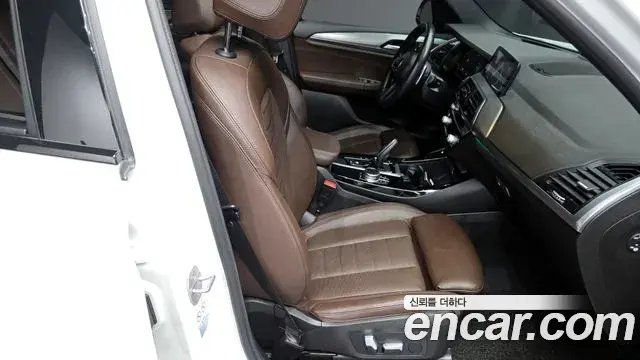 BMW X3 2021 — ფოტო 15/20