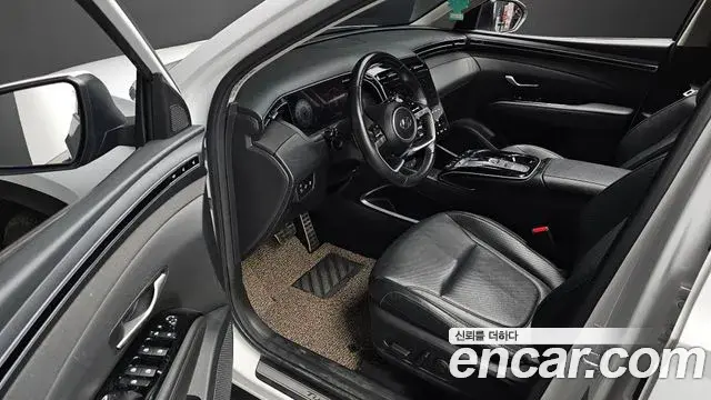 Hyundai Tucson Hybrid 2023 — ფოტო 19/20