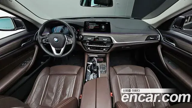 BMW 5 Series 2018 — Фото 7/20