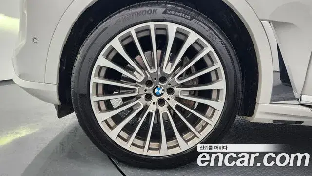 BMW X7 2023 — ფოტო 4/20