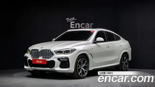 BMW X6 2020 — Фото 1/20