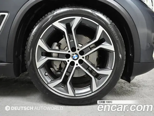 BMW X5 2022 — Фото 4/20