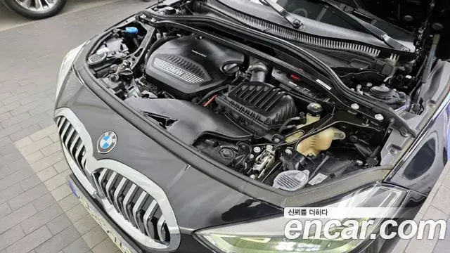 BMW 1 Series 2021 — Şəkil 18/20