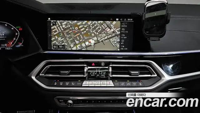 BMW X7 2022 — ფოტო 6/20