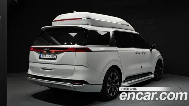 Kia Carnival 2023 — ფოტო 4/33
