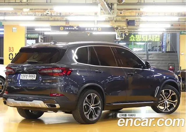 BMW X5 2022 — Фото 1/20