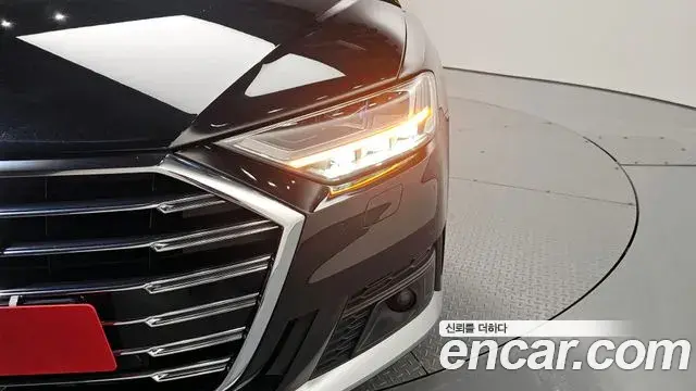 Audi A8 2021 — ფოტო 14/36