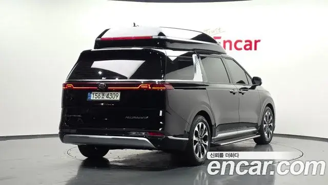 Kia Carnival 2021 — ფოტო 16/38