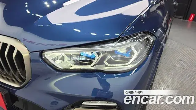 BMW X5 2020 — ფოტო 30/33