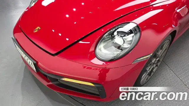 Porsche 911 2021 — ფოტო 22/32