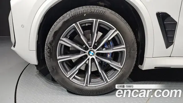 BMW X5 2024 — ფოტო 21/33
