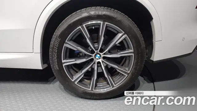 BMW X5 2024 — ფოტო 19/33