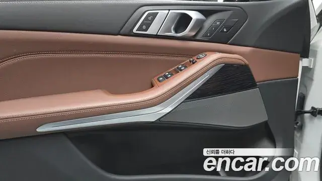 BMW X5 2024 — ფოტო 23/33