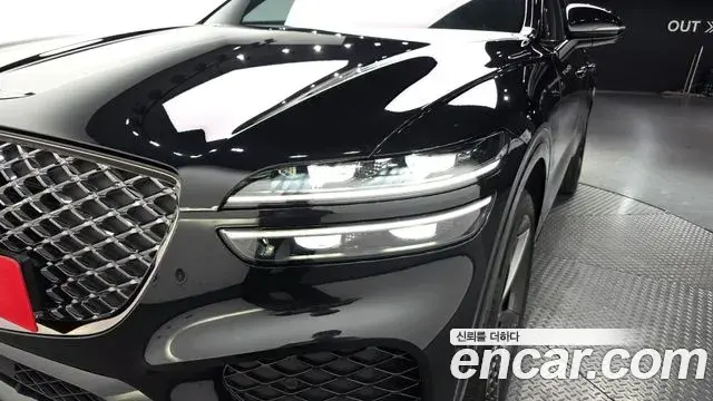 Genesis GV70 2021 — ფოტო 24/34