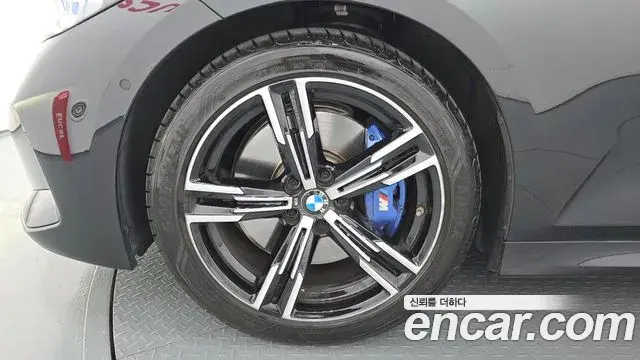 BMW 3 Series 2024 — Photo 24/36