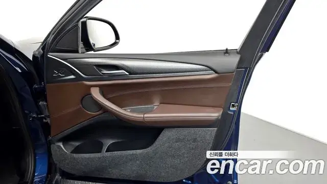 BMW X4 2023 — ფოტო 17/32