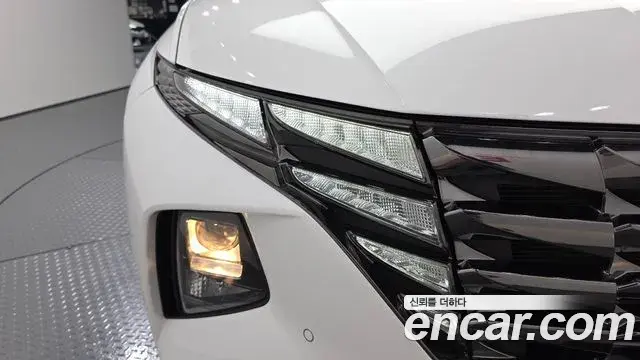 Hyundai Tucson Hybrid 2021 — ფოტო 10/30
