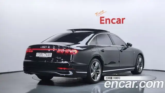 Audi A8 2023 — Фото 2/20