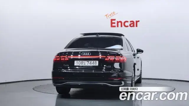 Audi A8 2023 — Фото 4/20