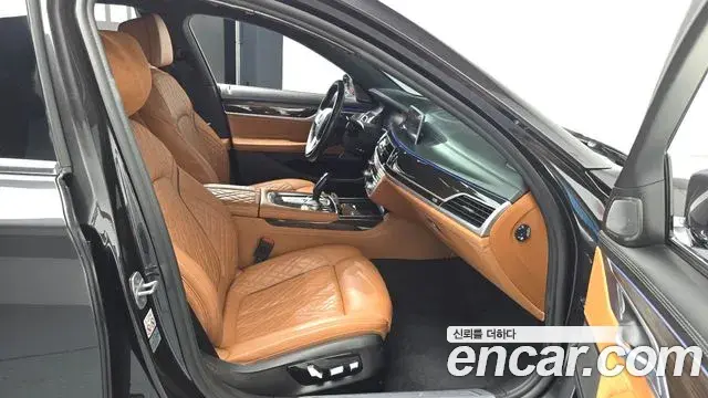 BMW 7 Series 2019 — ფოტო 34/36