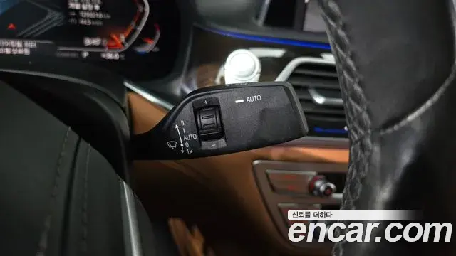 BMW 7 Series 2019 — ფოტო 1/36