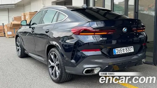 BMW X6 2022 — Фото 1/20