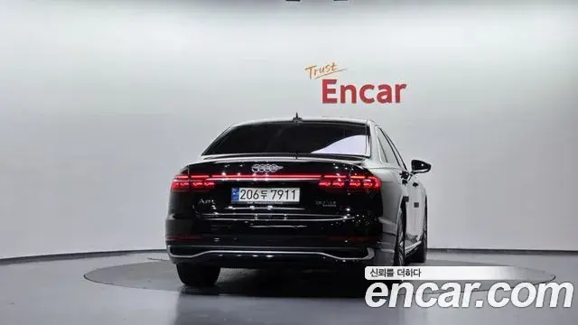 Audi A8 2023 — Фото 3/20