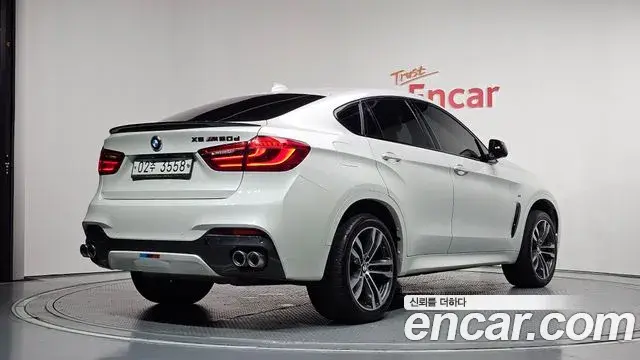 BMW X6 2018 — Фото 2/20