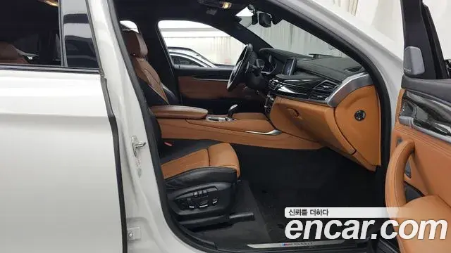 BMW X6 2018 — Фото 11/20