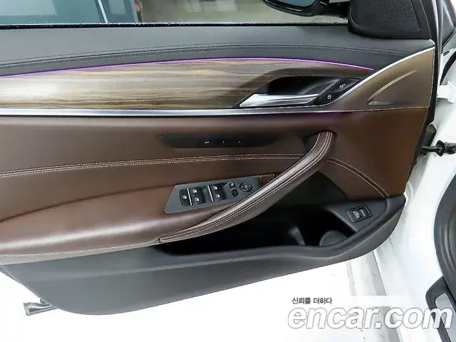 BMW 5 Series 2018 — Фото 16/20