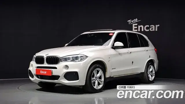 BMW X5 2018 — Фото 1/20