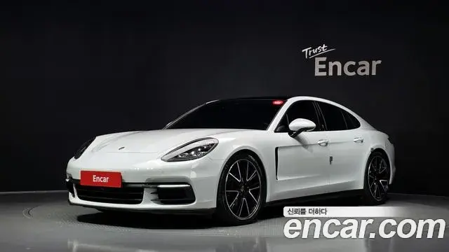 Porsche Panamera 2020 — Фото 1/20