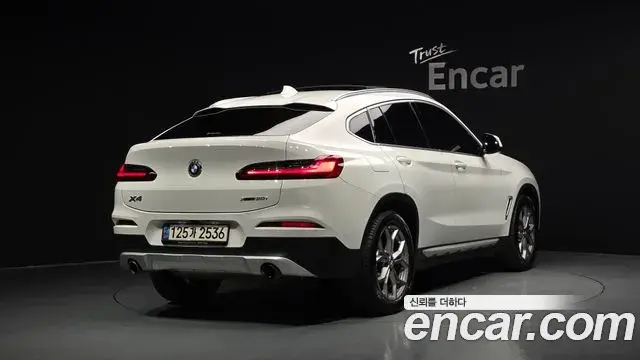 BMW X4 2021 — Фото 2/20