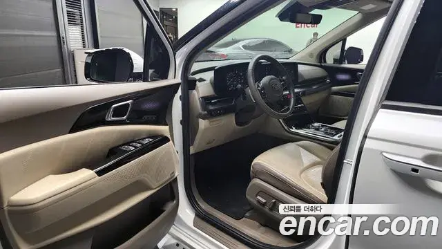Kia Carnival 2021 — ფოტო 7/20