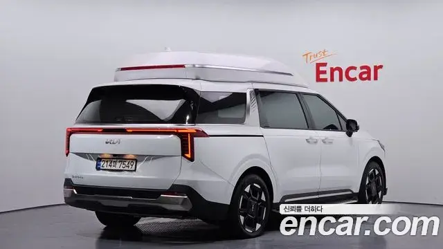 Kia Carnival 2024 — ფოტო 19/20