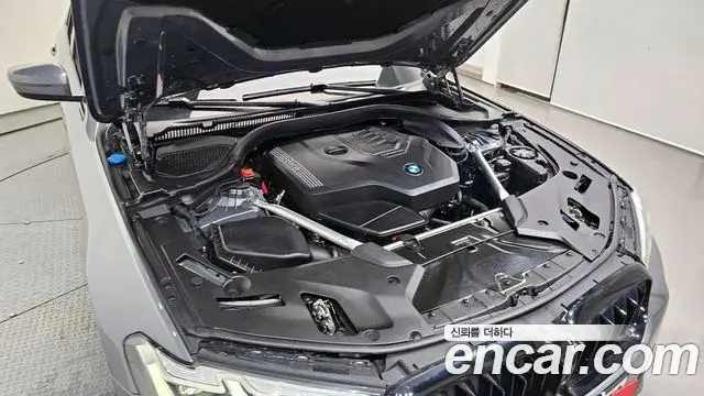 BMW 5 Series 2023 — ფოტო 19/20