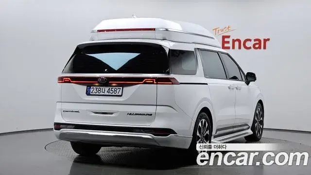 Kia Carnival 2021 — ფოტო 8/20