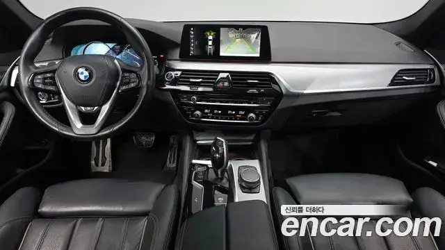 BMW 5 Series 2018 — Фото 7/20