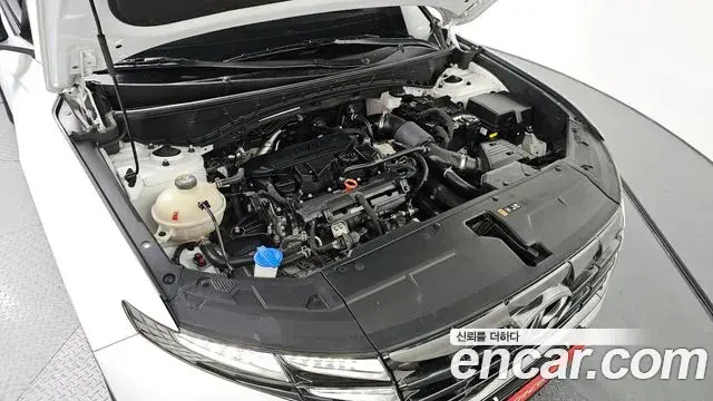 Hyundai Tucson Hybrid 2023 — ფოტო 9/20