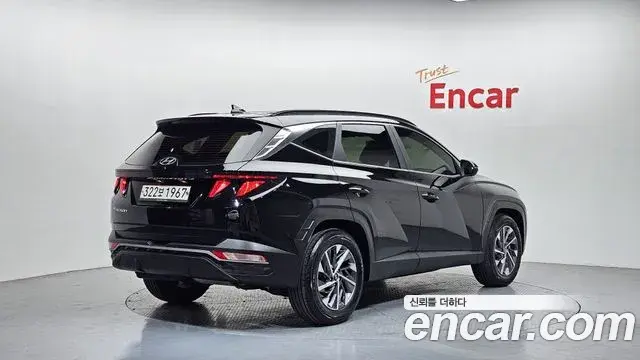 Hyundai Tucson Hybrid 2021 — ფოტო 9/20