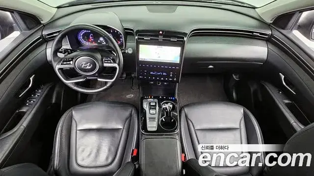 Hyundai Tucson Hybrid 2021 — ფოტო 1/20