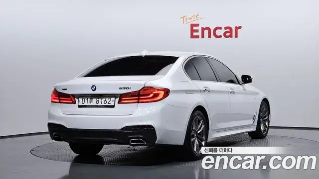 BMW 5 Series 2018 — Фото 2/20