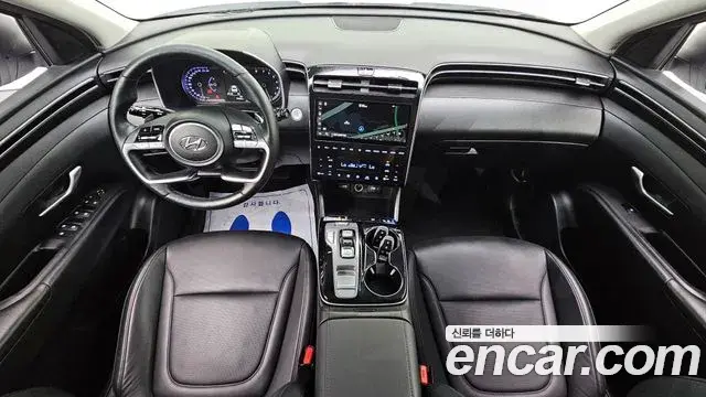 Hyundai Tucson Hybrid 2021 — ფოტო 9/20