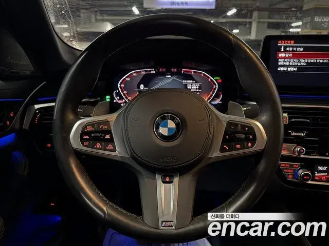 BMW 5 Series 2022 — Фото 10/20