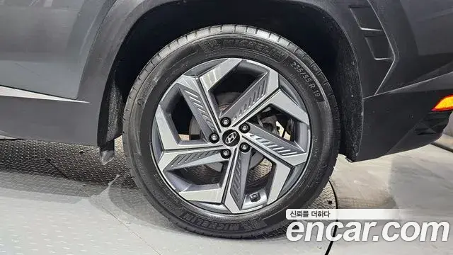 Hyundai Tucson Hybrid 2021 — ფოტო 2/33