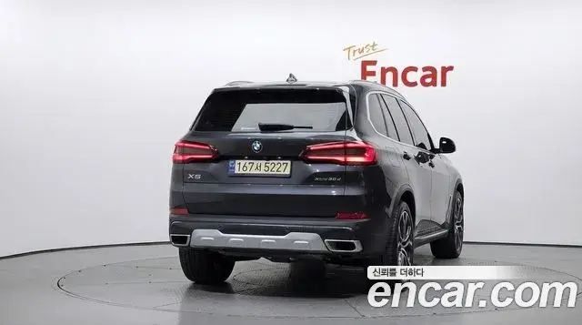 BMW X5 2022 — ფოტო 4/31