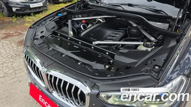 BMW X5 2022 — ფოტო 22/31