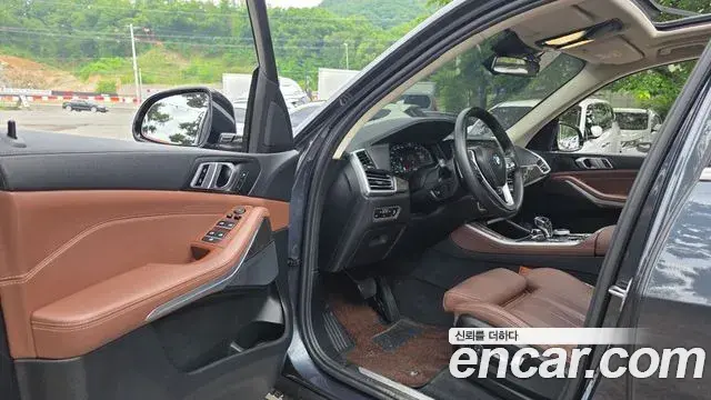 BMW X5 2022 — ფოტო 21/31