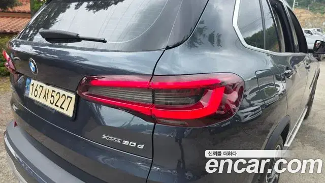 BMW X5 2022 — ფოტო 19/31