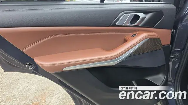 BMW X5 2022 — ფოტო 23/31